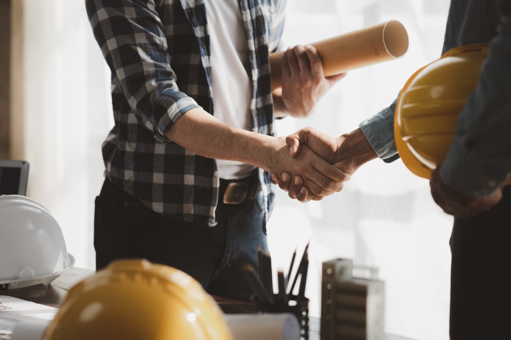 Contractor handshake on a project